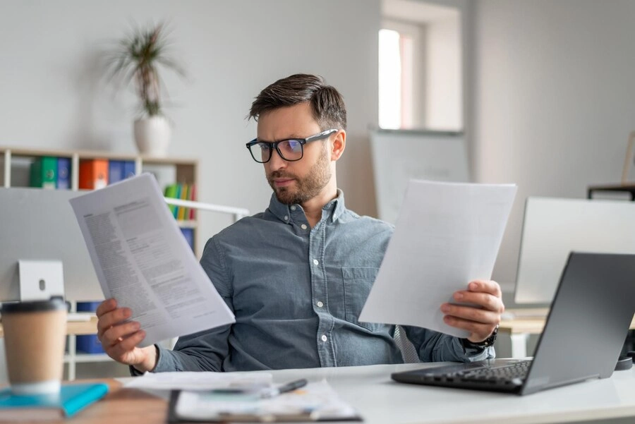 musician reviewing tax documents and finances