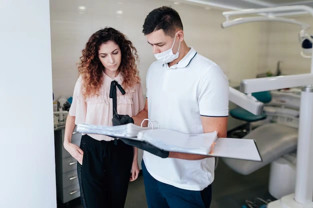 dentists reviewing financial records