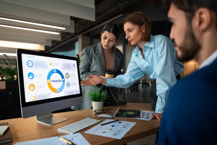 Professionals conducting data-driven auditing with advanced tools.
