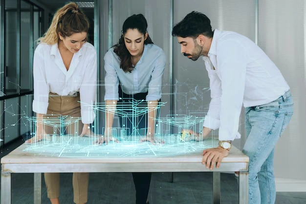 Our Team collaborating on technology integration and automation with 3D holographic models